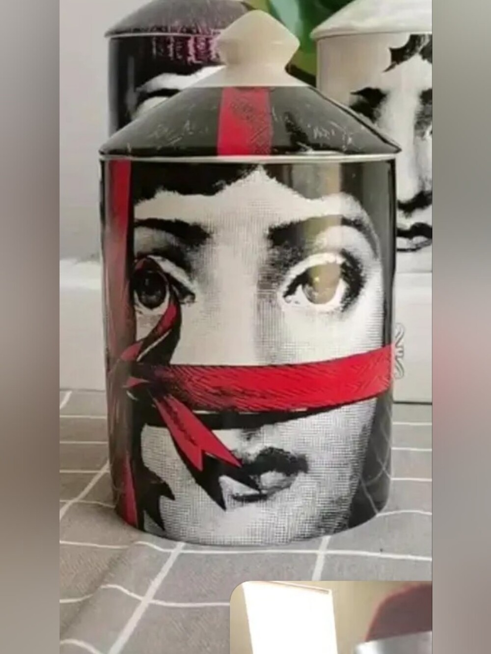 Decorative Face Print Tin Canister with Red Accents